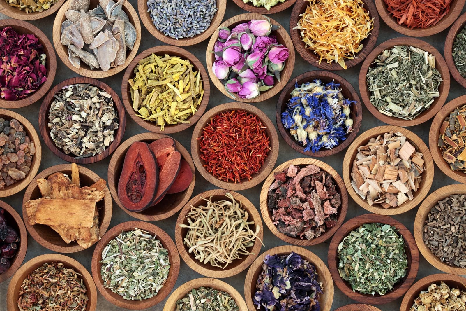 Top view of medicinal herbs, roots, petals and spices